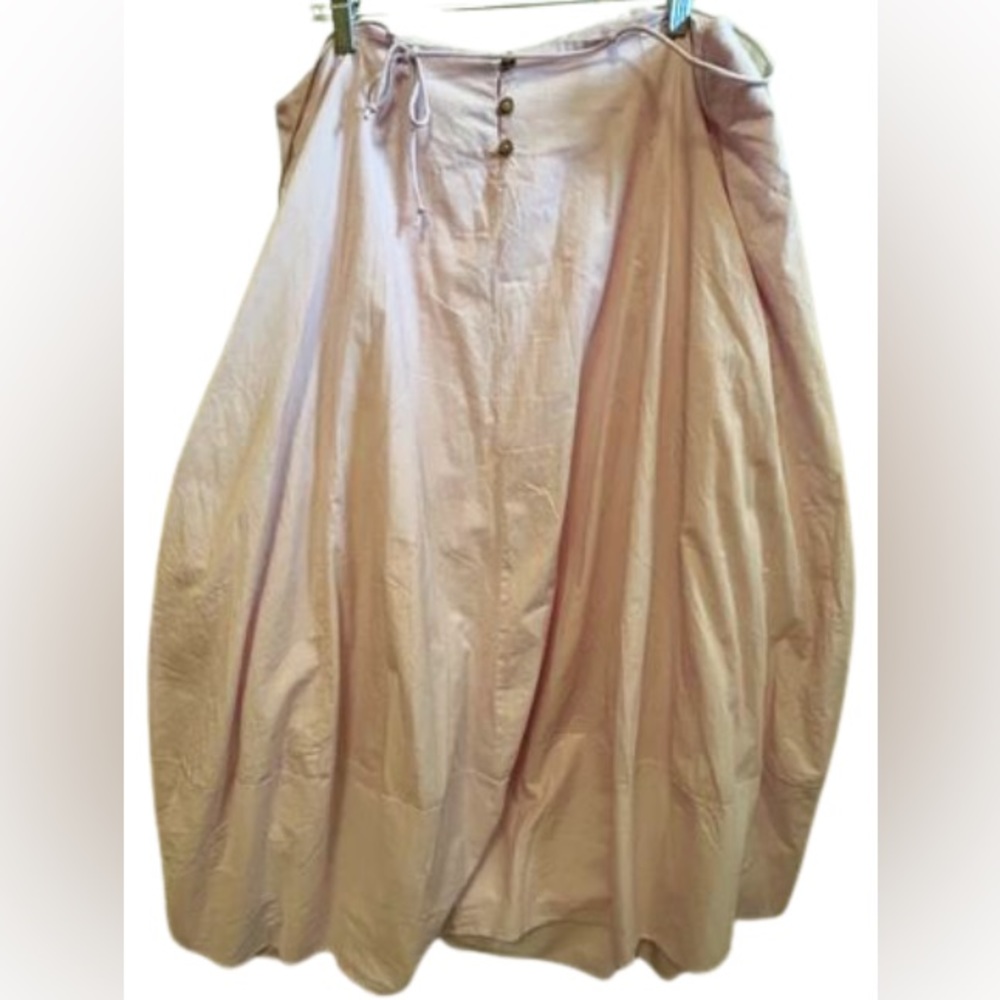 Free People gathered coquette,light pink dress with a lining.Bottom waist Size L